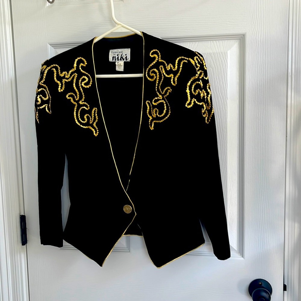 Black velvet fitted evening jacket/w gold trim;  fitted waist and peplum